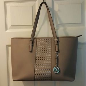 Michael Kors Jet Set grommet bag